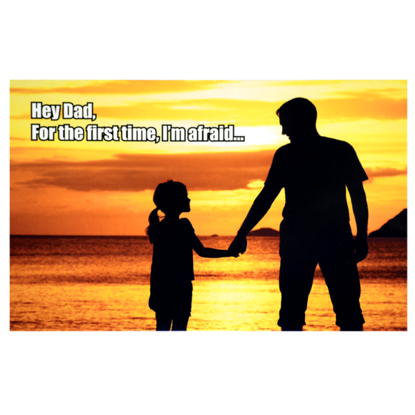 A father and daughter holding hands at sunset.