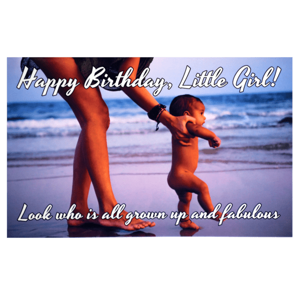 A woman and baby on the beach with a birthday message.