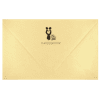 A yellow envelope with a mickey mouse stamp on it.