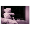 A teddy bear sitting on the ground with a cat.
