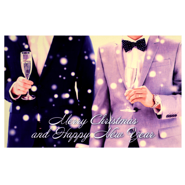 Two men in suits holding champagne glasses.