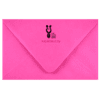 A pink envelope with a mickey mouse logo on it.
