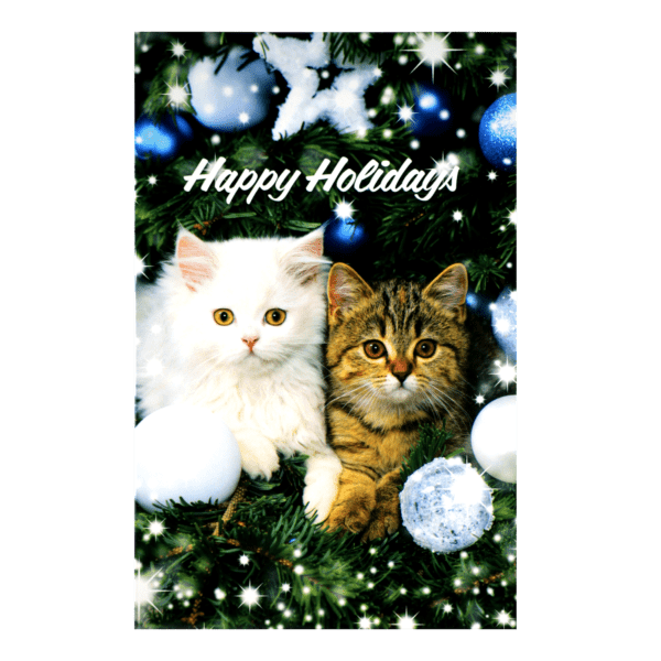 Two cats sitting in a christmas tree with blue and white ornaments.