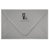 A white envelope with a black and white logo.