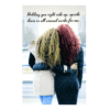 Two women standing next to each other on a sidewalk.