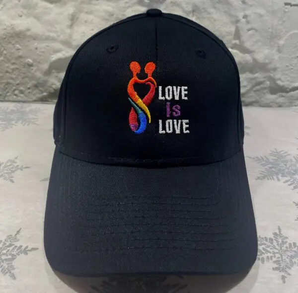 A black hat with the words love is love on it.