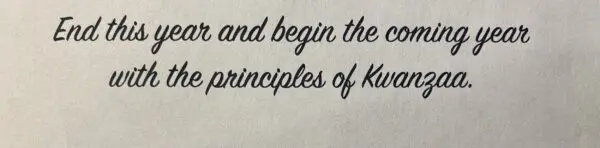 A close up of the words and begin the principles of karma