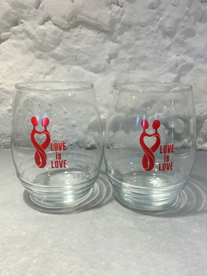 Two glasses with a red lobster on them