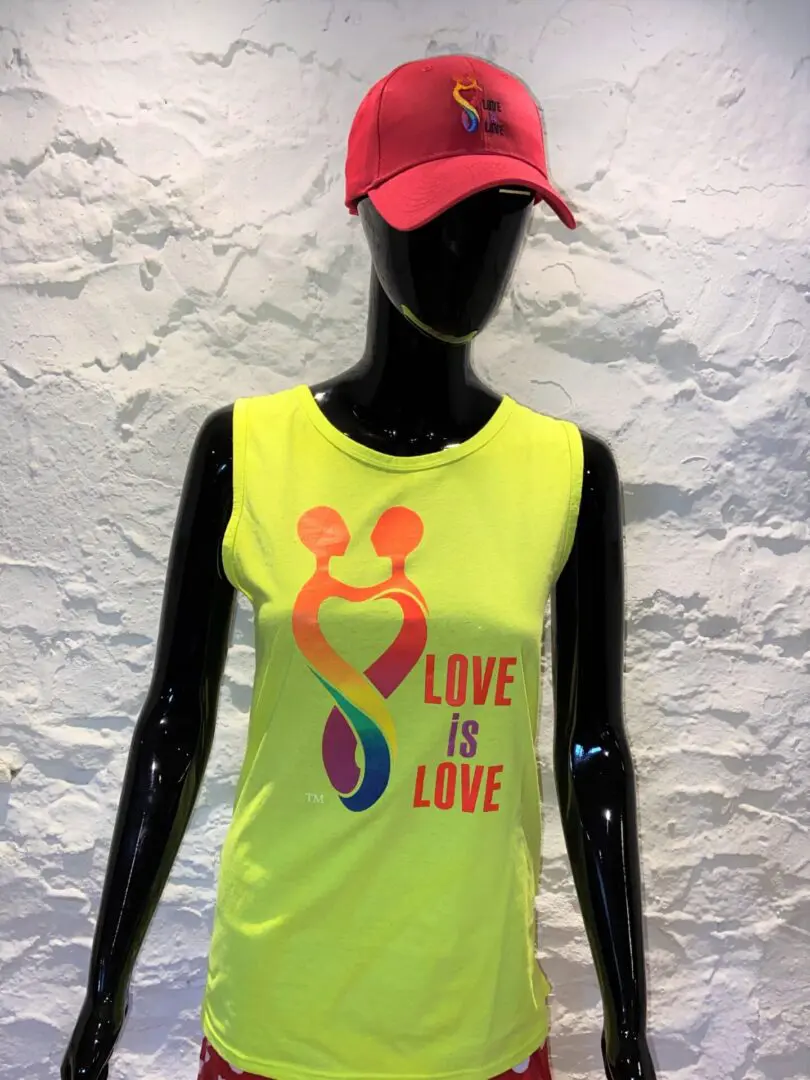 A neon yellow tank top with the words " love is love ".