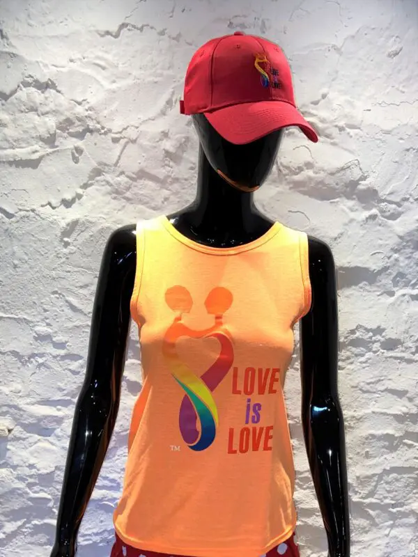 A mannequin wearing a hat and a t-shirt.