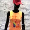 A mannequin wearing a hat and a t-shirt.