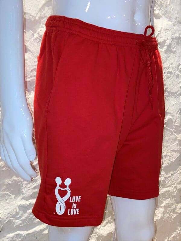 A red shorts with a white logo on the side.