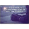 A person holding something in their hand with a quote on it.