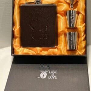 A gift set with two cups and a flask.