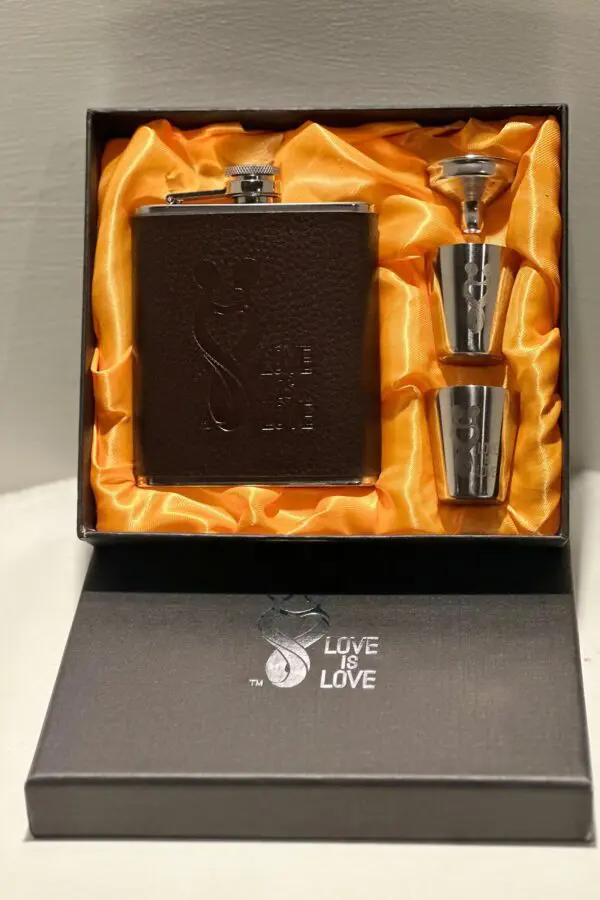 A gift set with two cups and a flask.