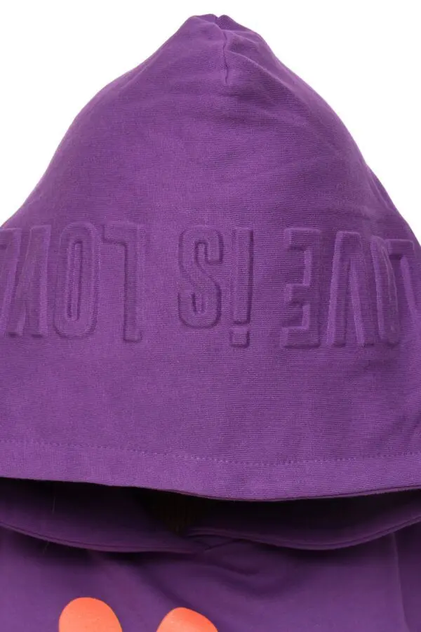 A purple hooded towel with the word " not today ".