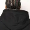 A person with their back turned to the camera.